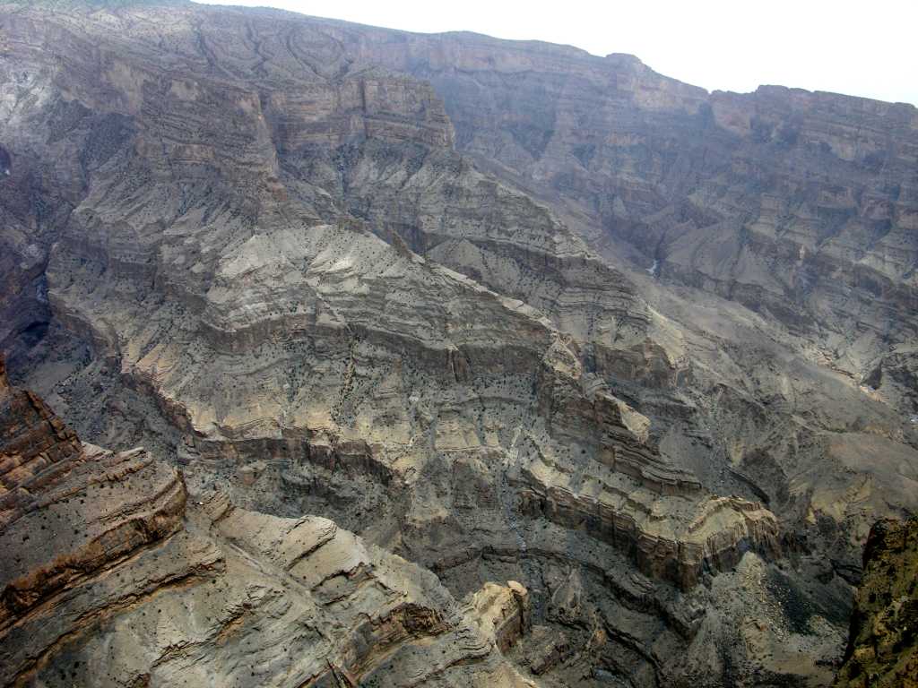 Muscat 07 10 Jebel Shams Canyon Wide View Jebel Shams is Oman�s highest mountain (3075m) and means �Mountain of the Sun�. It is best known for its spectacularly deep Wadi Ghul lying alongside it, making it the Grand Canyon of Oman.